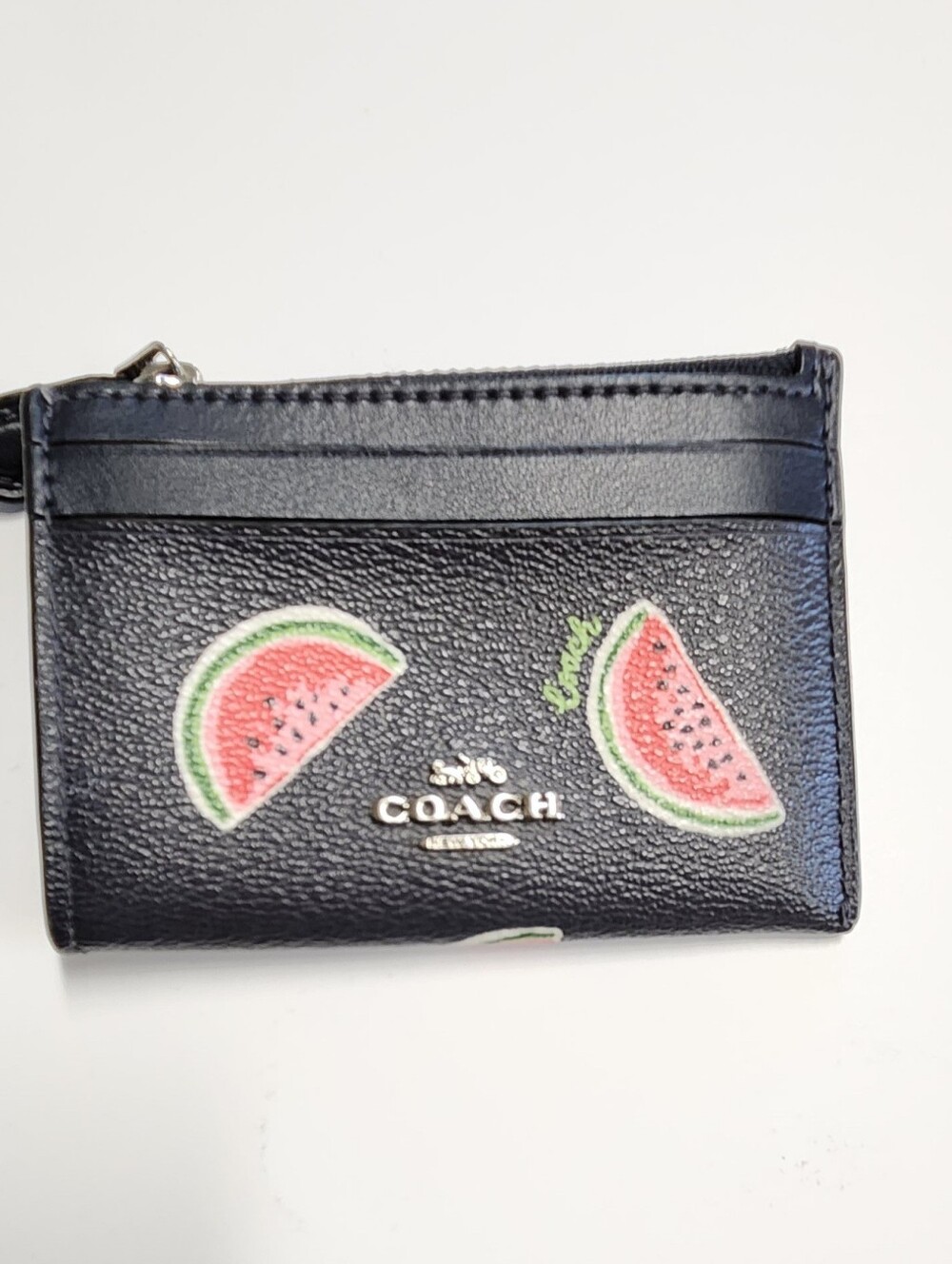 Coach Navy Mini Skinny Card Holder with Watermelon Motif. Crack In ID Window